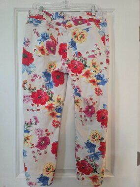 Flowered jeans that come just above the ankles